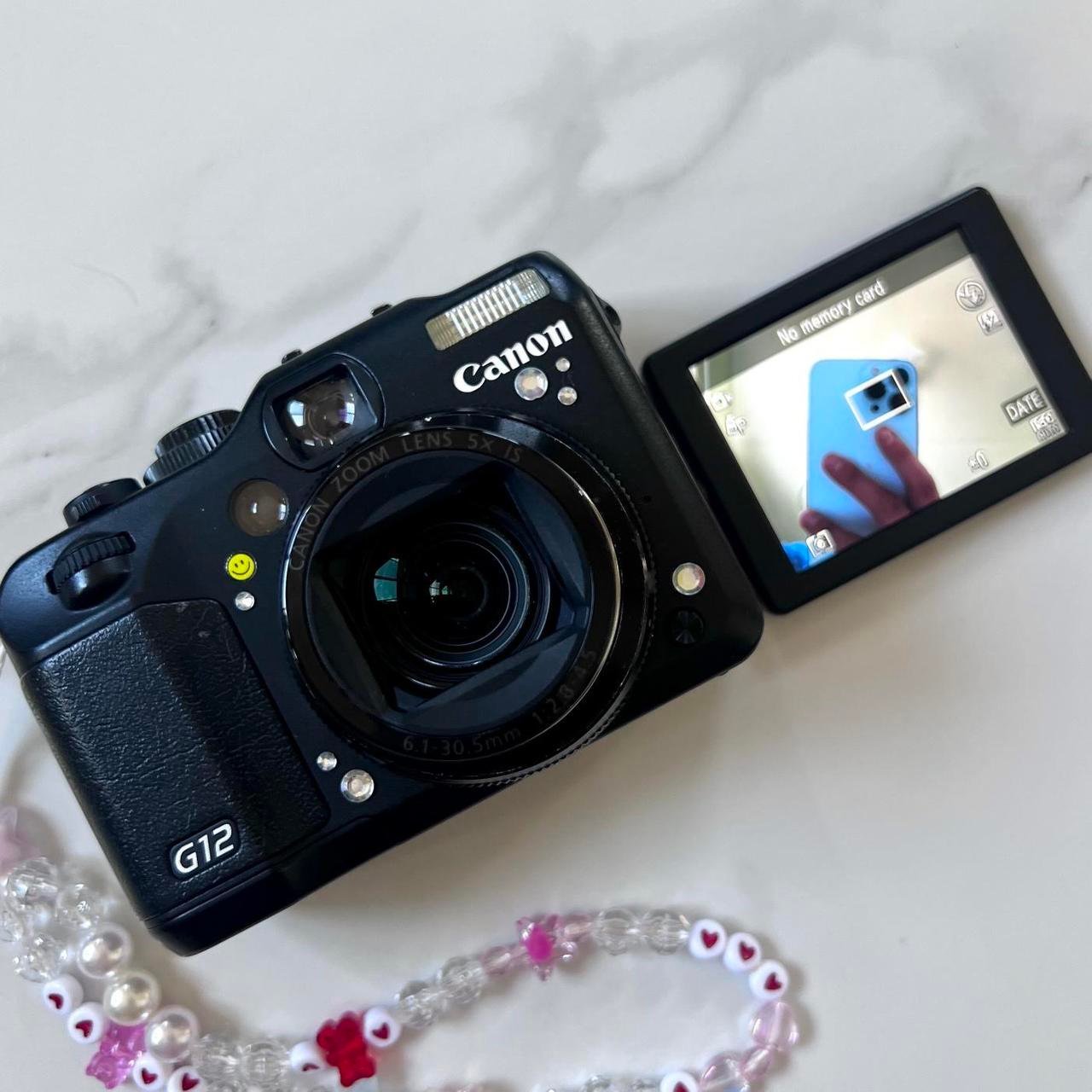 P0_2d041b0a-c086-4eef-aecb-27c565fd1301.jpg Canon PowerShot G12 - Image 1