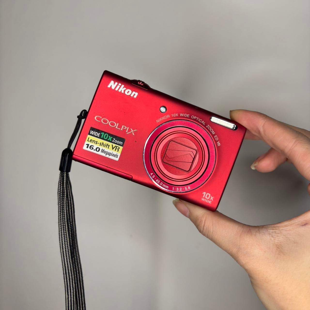 P0_a23aaa19-5d85-4c34-b98f-9a0eccd324c0.jpg Nikon Coolpix Digital Camera S6200 16MP Digital Camera in Red - Image 1